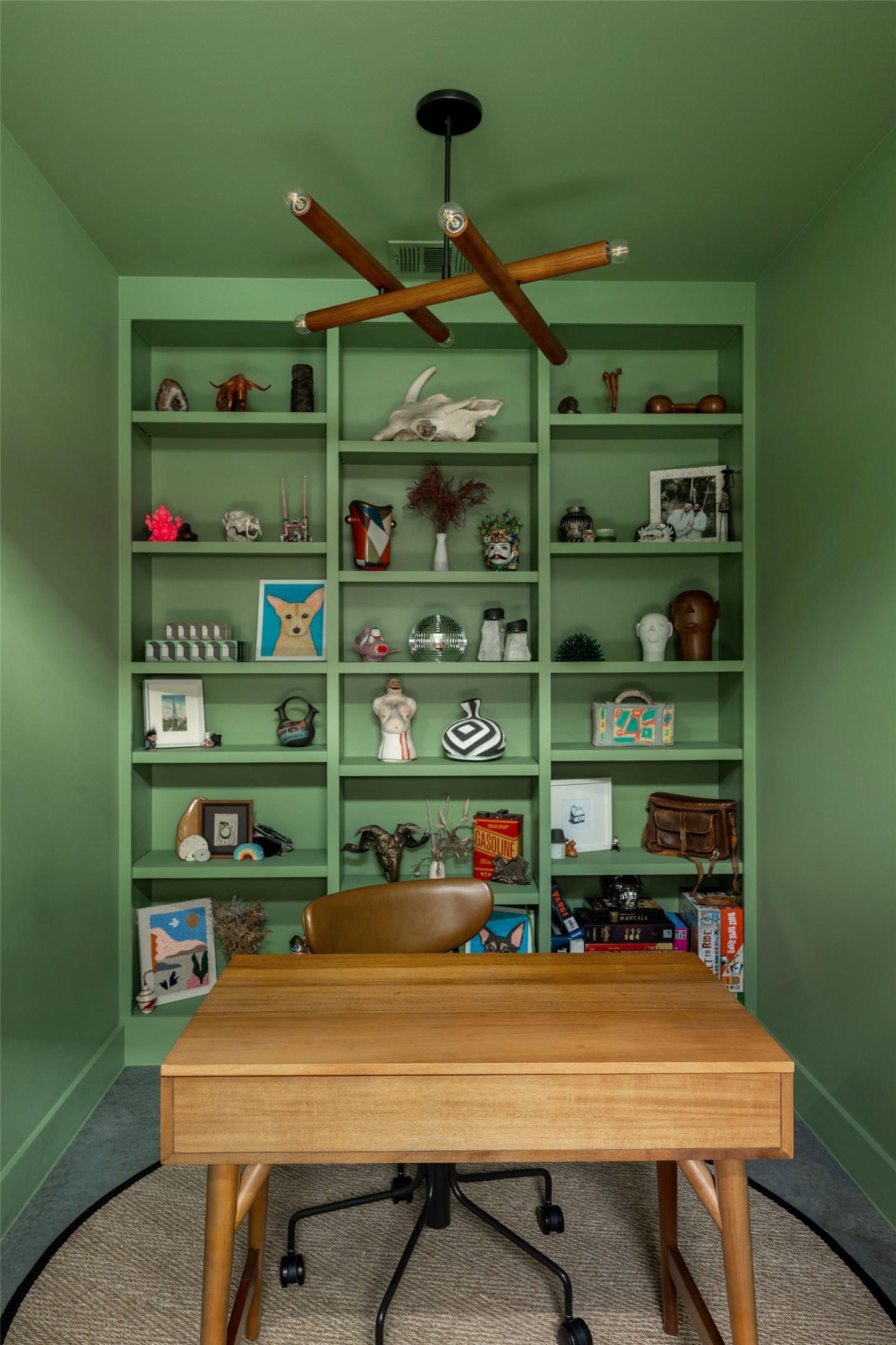 1605 Maple Avenue Austin, TX 78702 - Photo 13 of 33 Built-in shelving unit with a modern ceiling fixture