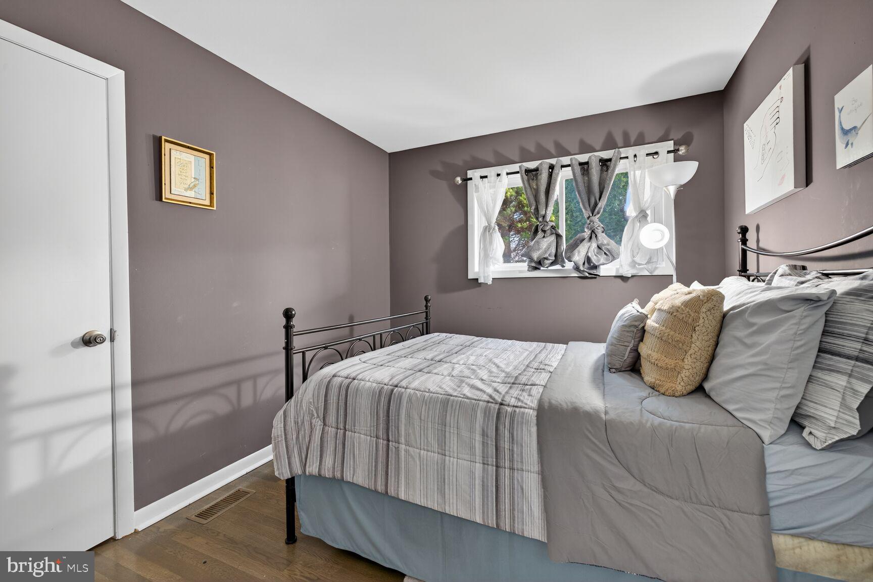 8418 Mapleville Road Boonsboro, MD 21713 - Photo 16 of 30 a bedroom with a bed and window