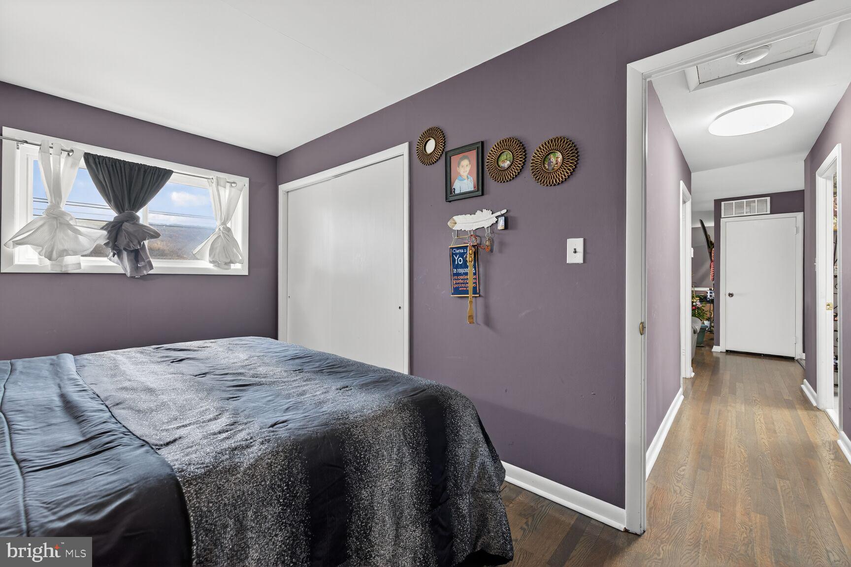 8418 Mapleville Road Boonsboro, MD 21713 - Photo 19 of 30 a bedroom with a bed and a window