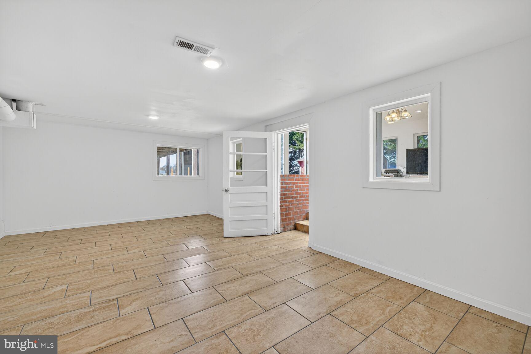 8418 Mapleville Road Boonsboro, MD 21713 - Photo 24 of 30 a view of an empty room with a window