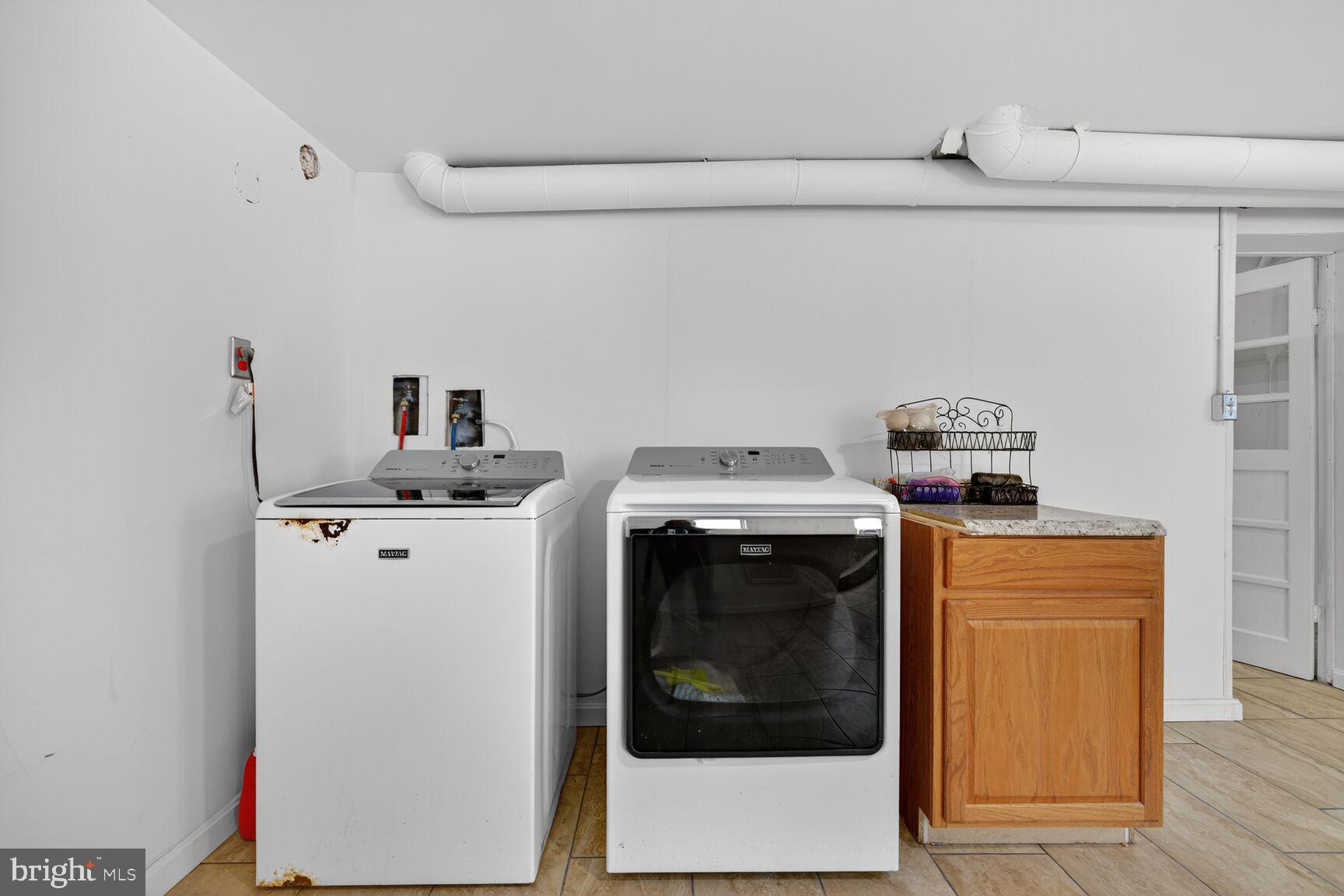 8418 Mapleville Road Boonsboro, MD 21713 - Photo 25 of 30 a utility room with dryer and washer
