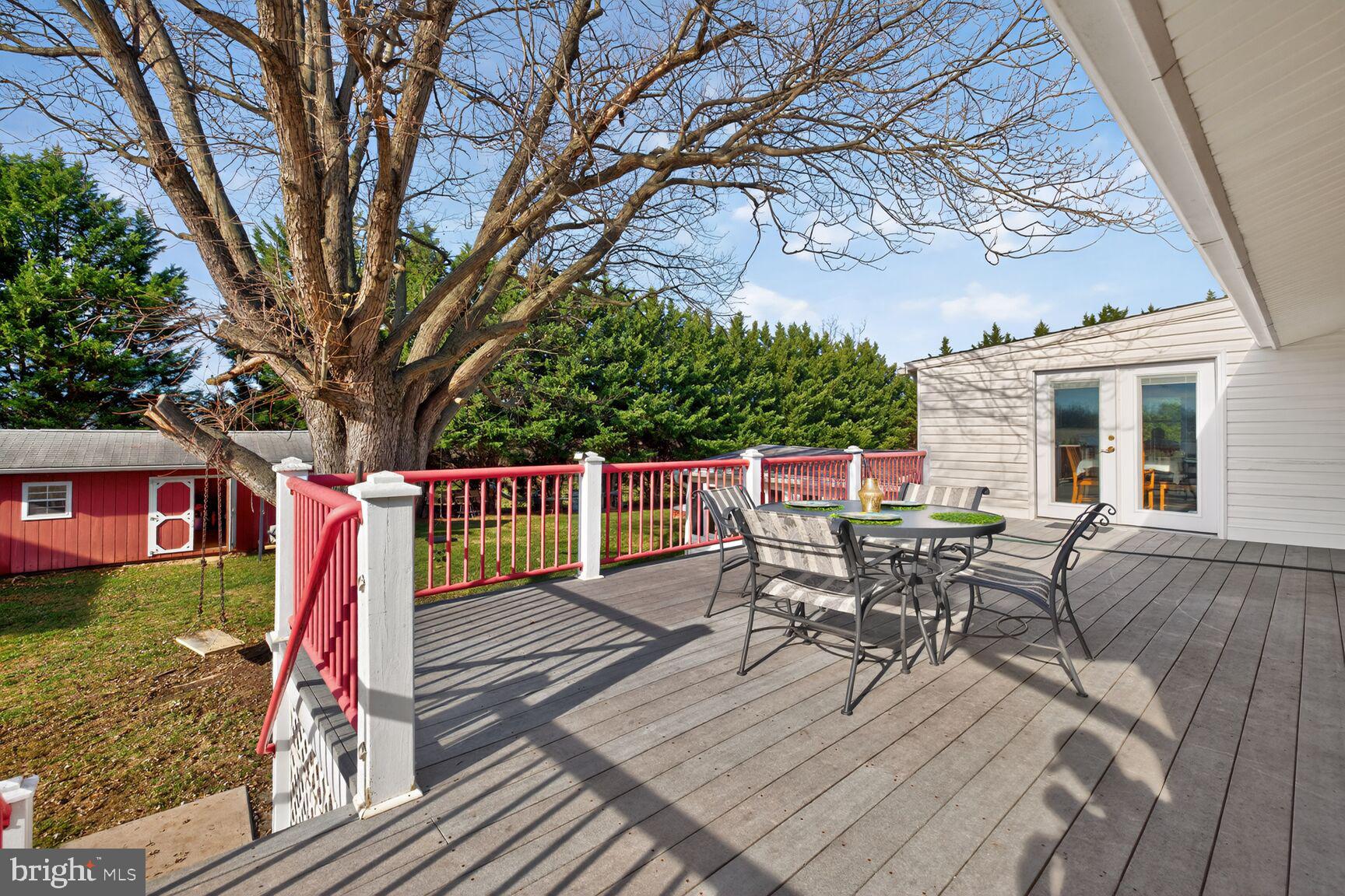 8418 Mapleville Road Boonsboro, MD 21713 - Photo 28 of 30 a view of a chairs and tables in the balcony