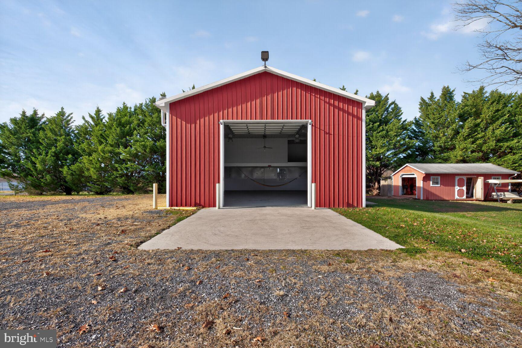 8418 Mapleville Road Boonsboro, MD 21713 - Photo 29 of 30 a front view of a house with a yard and garage