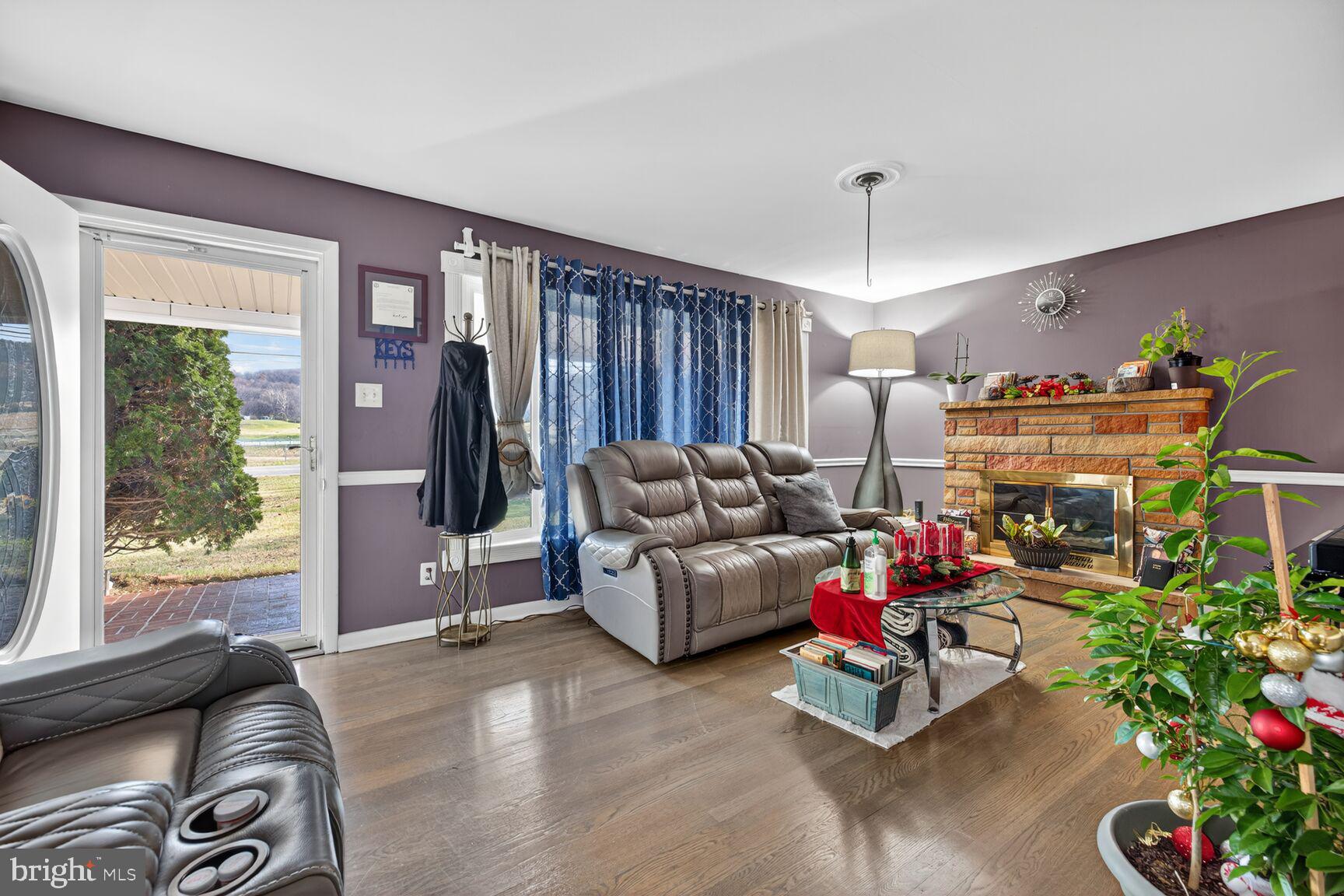 8418 Mapleville Road Boonsboro, MD 21713 - Photo 6 of 30 a living room with furniture and a window
