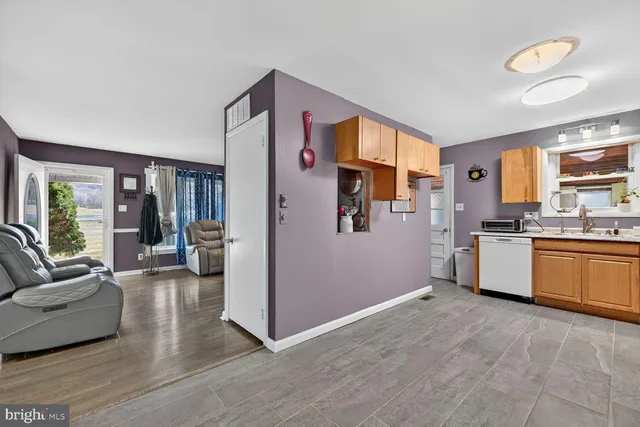 a view of a livingroom with wooden floor
