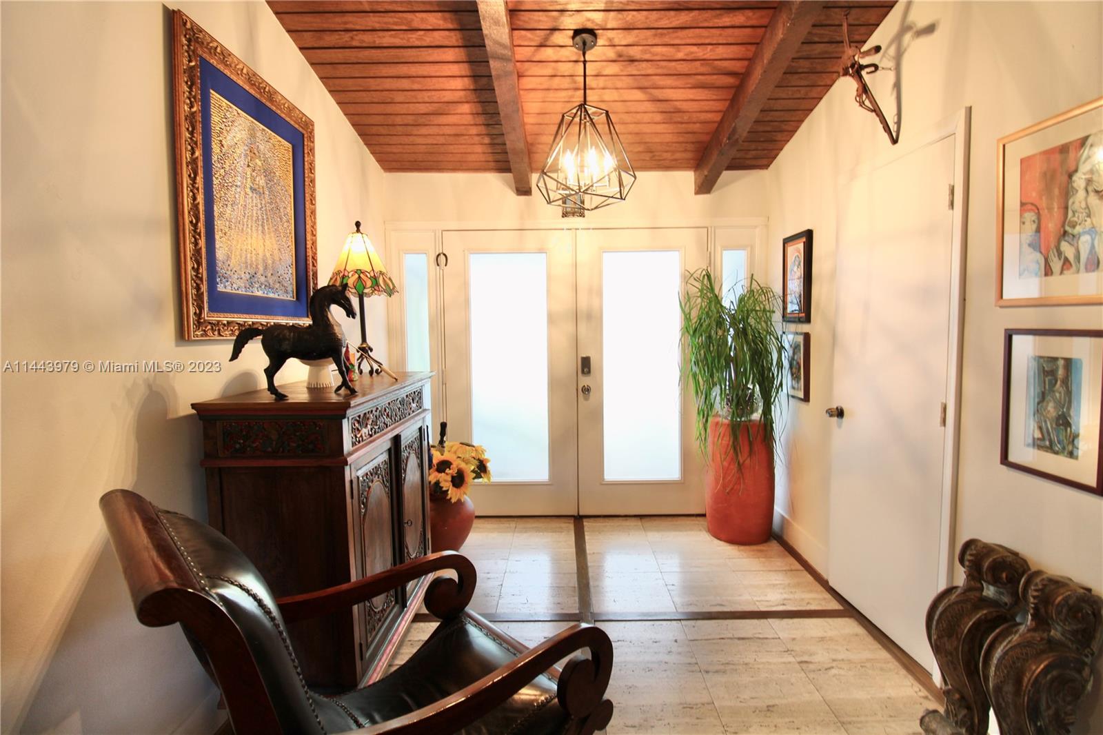 11370 Southwest 118th Street Miami, FL 33176 - Photo 1 of 26 a view of a room with gym equipment