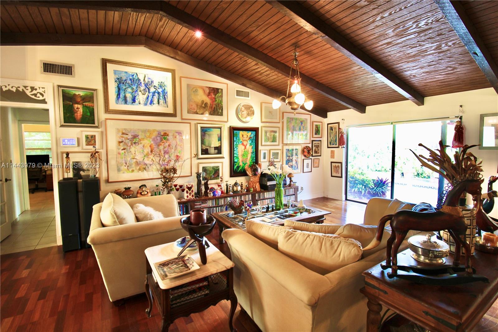 11370 Southwest 118th Street Miami, FL 33176 - Photo 6 of 26 a living room with furniture and a large window