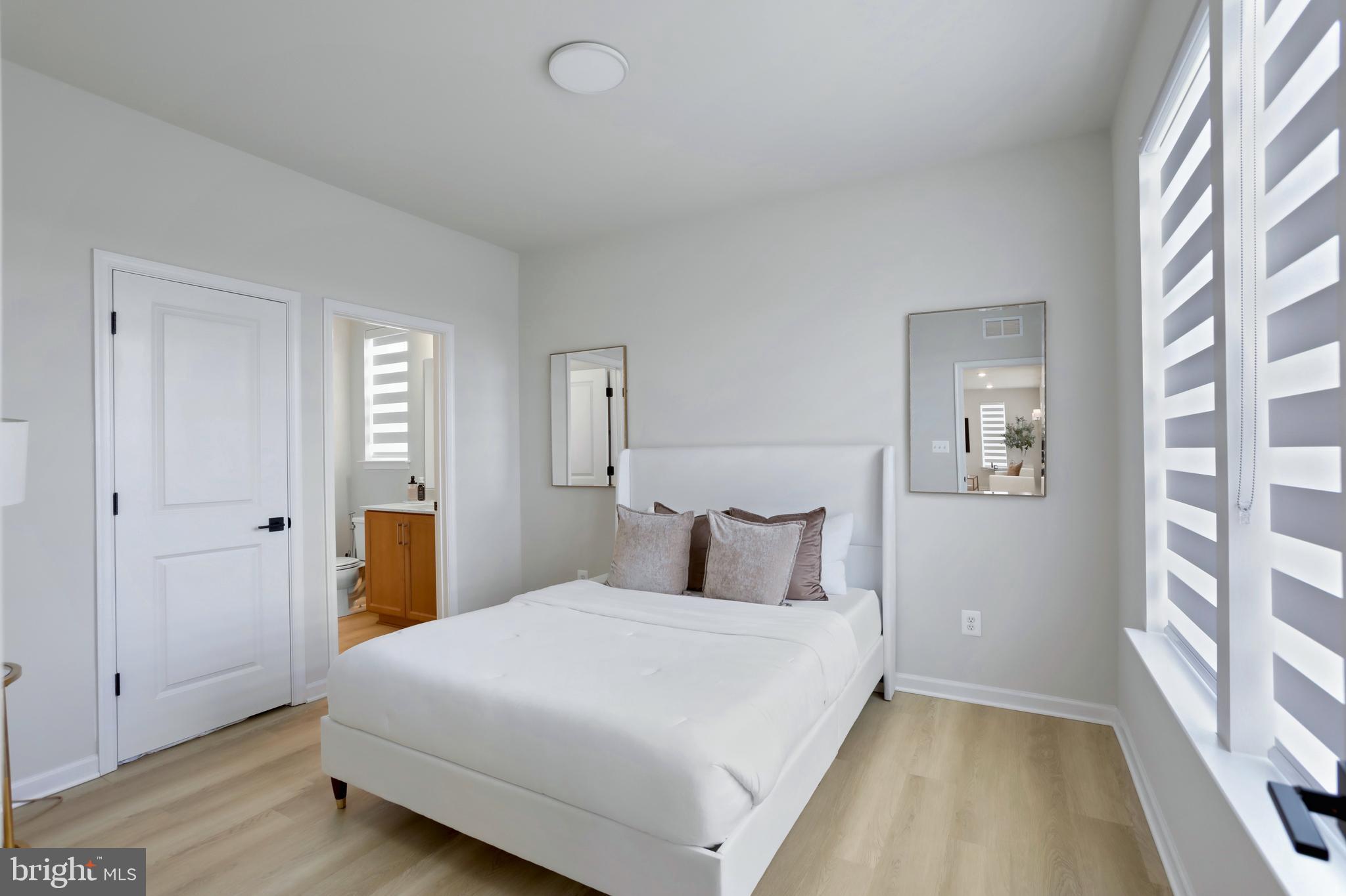 1011 Monocacy Crossing Parkway Brunswick, MD 21716 - Photo 13 of 43 a bedroom with a bed and a window