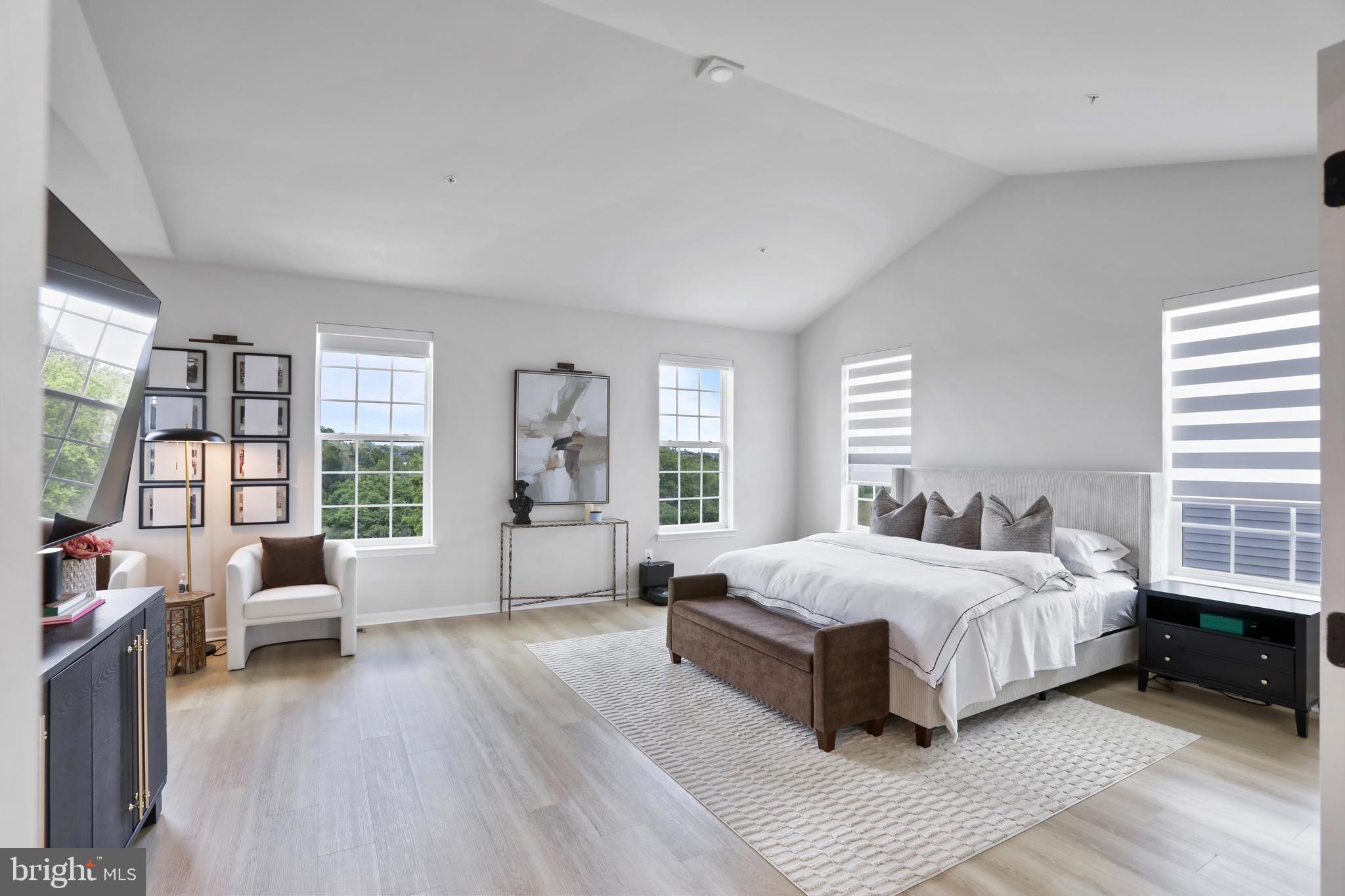 1011 Monocacy Crossing Parkway Brunswick, MD 21716 - Photo 18 of 43 a bedroom with a large bed and a large window