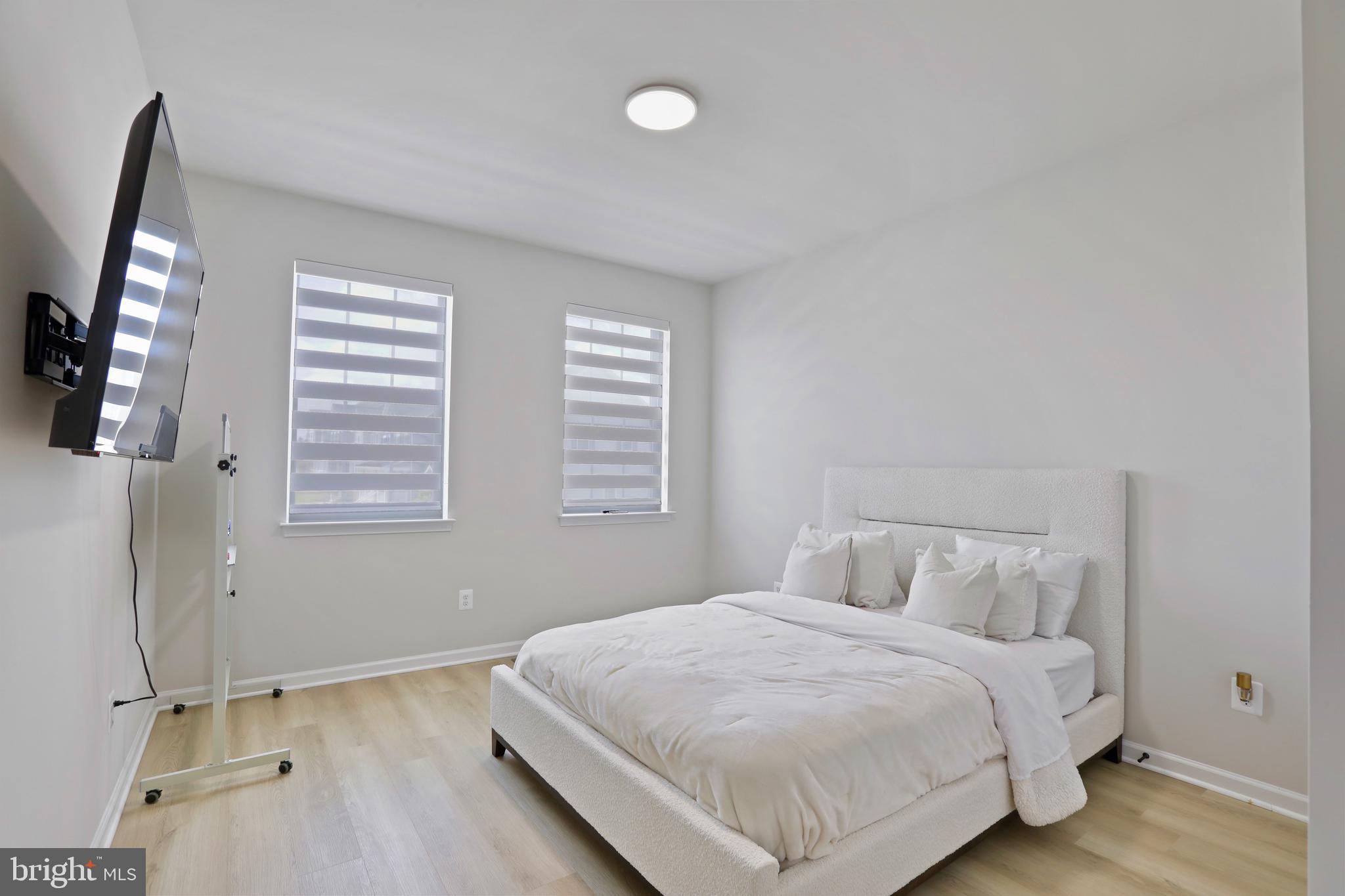 1011 Monocacy Crossing Parkway Brunswick, MD 21716 - Photo 25 of 43 a bedroom with a bed and a window