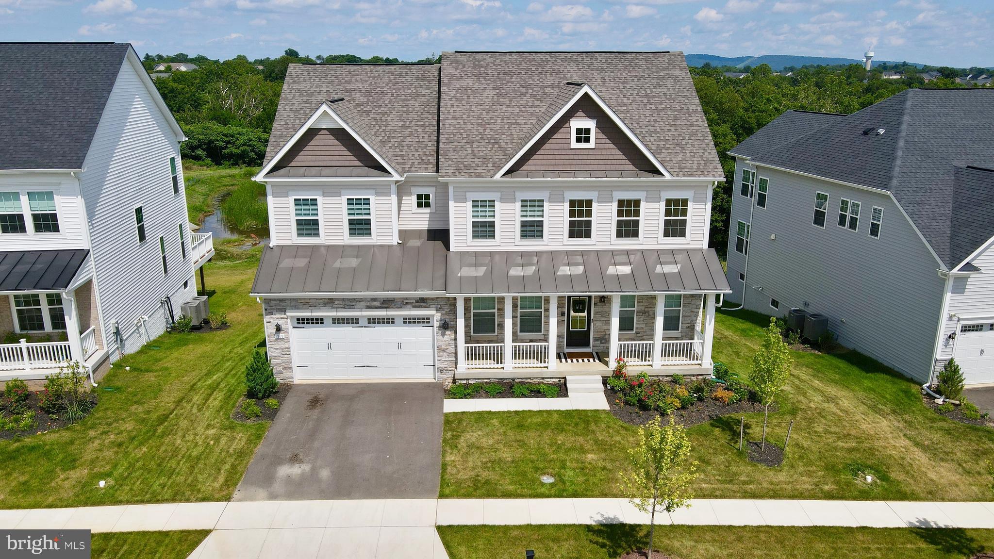 1011 Monocacy Crossing Parkway Brunswick, MD 21716 - Photo 32 of 43 a aerial view of a house with a yard