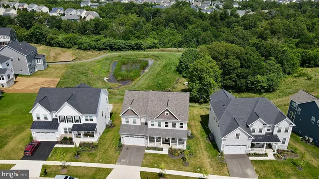 an aerial view of a house with a garden