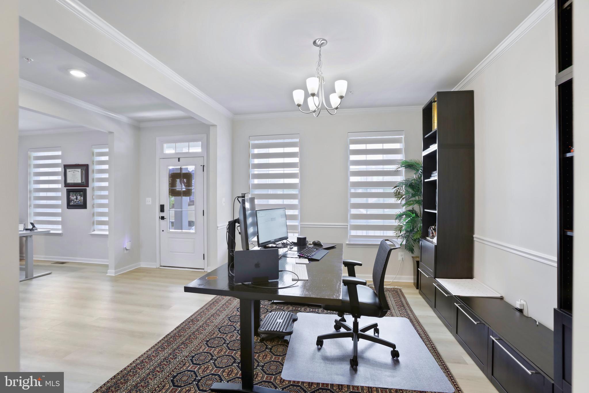 1011 Monocacy Crossing Parkway Brunswick, MD 21716 - Photo 10 of 43 a view of a dining room with furniture and wooden floor