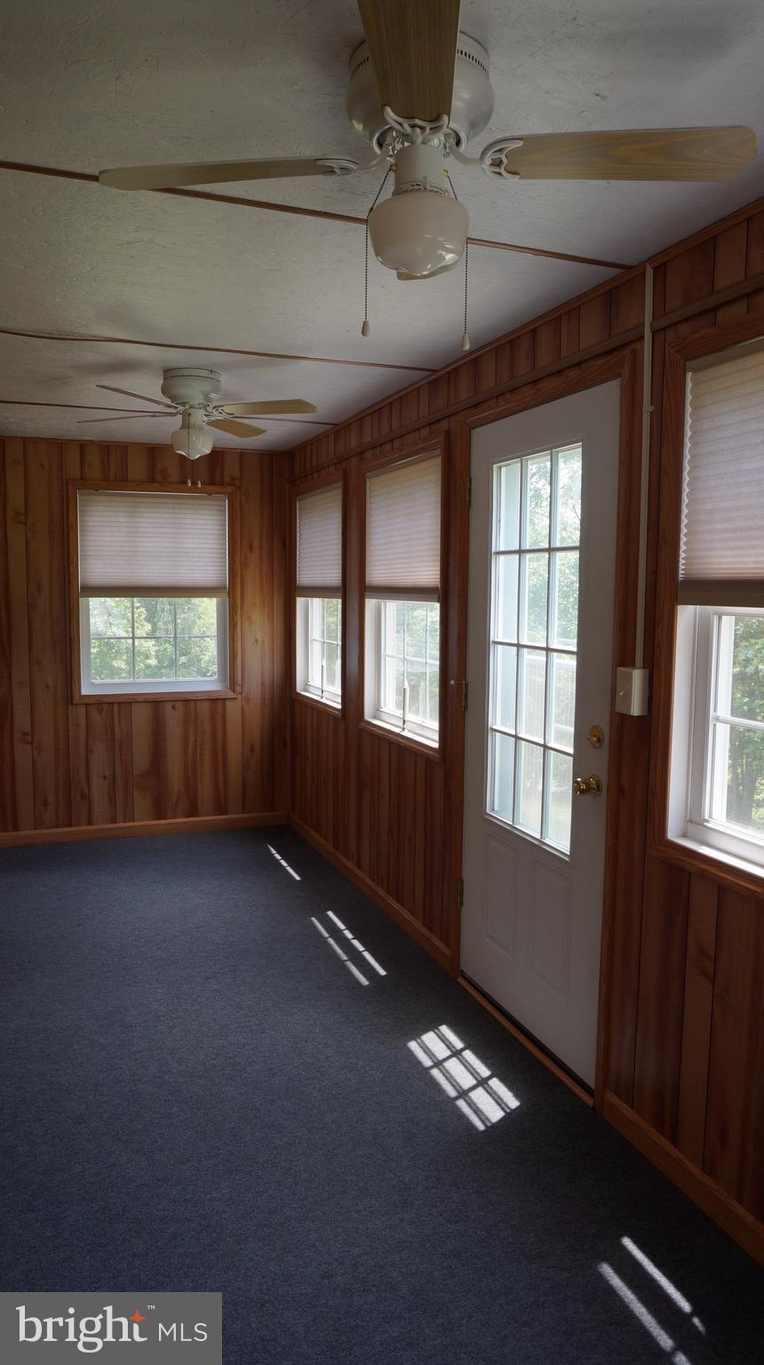 1612 Ungers Store Road Berkeley Springs, WV 25411 - Photo 11 of 30 Enclosed front porch
