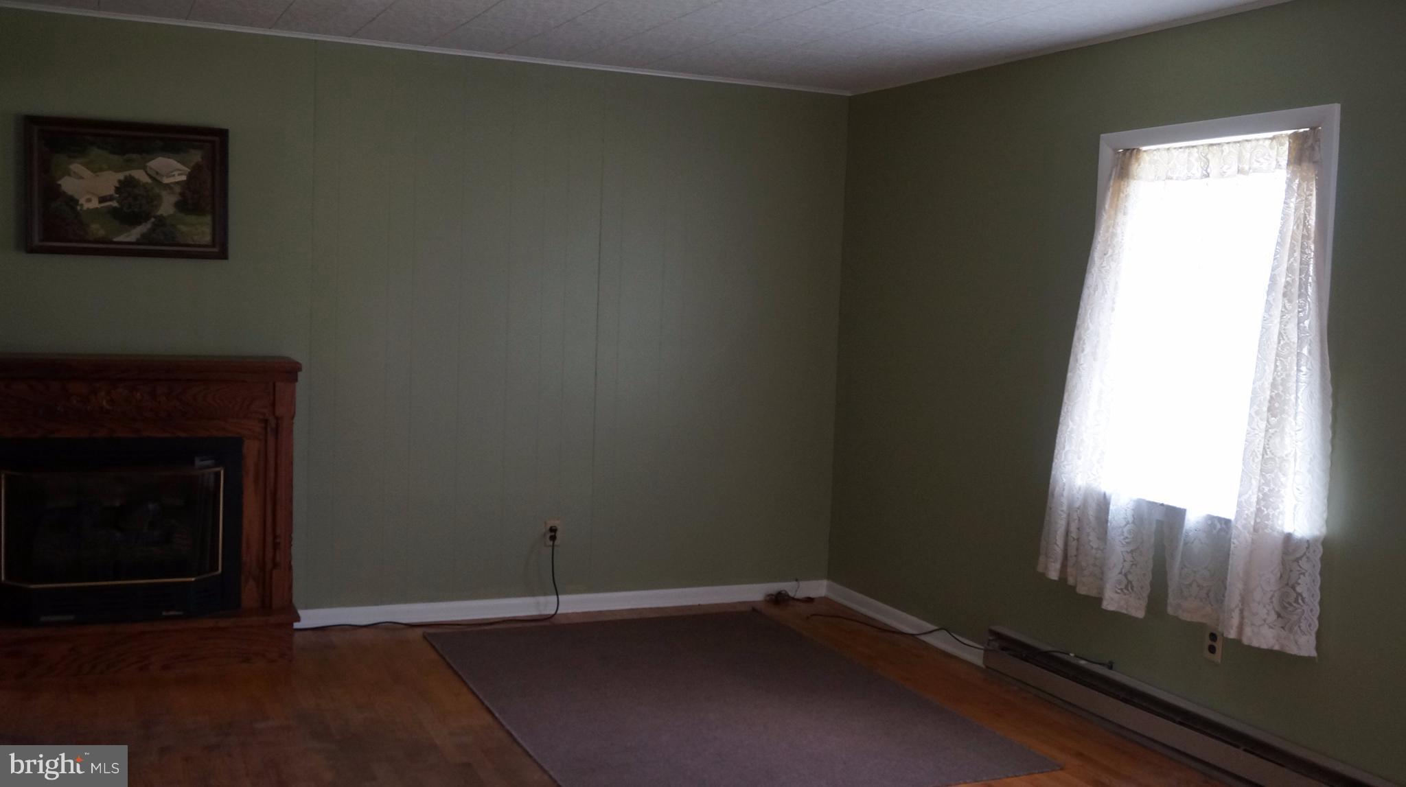 1612 Ungers Store Road Berkeley Springs, WV 25411 - Photo 23 of 30 Living Room