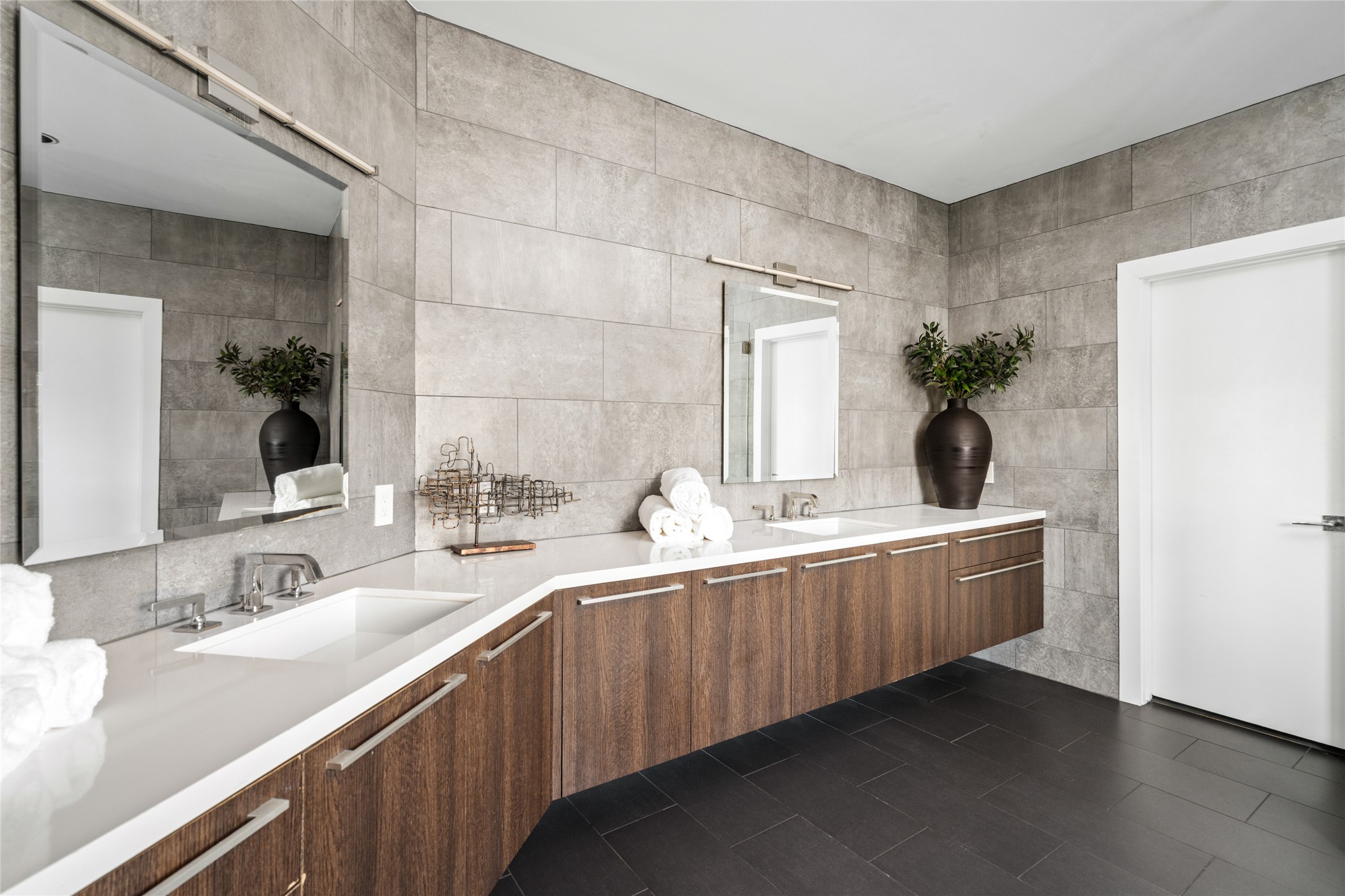 3703 Wroxton Road West University Place, TX 77005 - Photo 29 of 50 The primary bath with floating double vanity with ample storage in seperate his and hers walk-in closets