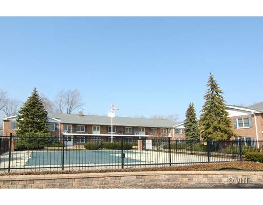 2812 Dundee Road, Unit C16 Northbrook, IL 60062 - Photo 1 of 1 a view of a house with a backyard