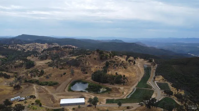 a view of a houses with a yard