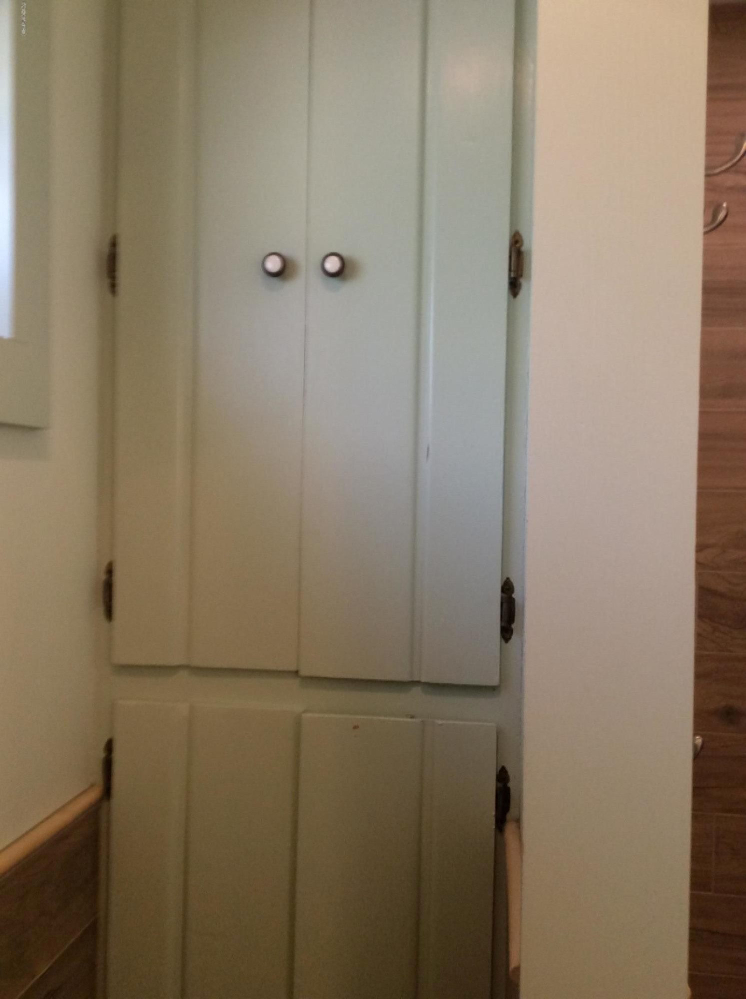 5562 Lakeshore Road Manistee, MI 49660 - Photo 54 of 64 Linen Closet in Bathroom