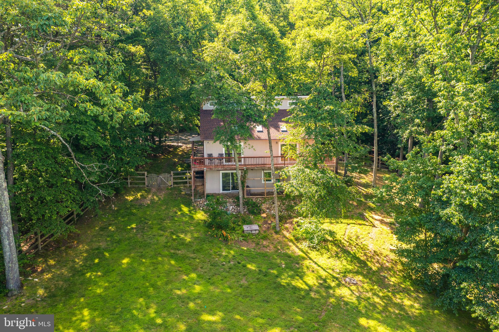 1619 Summit Drive Haymarket, VA 20169 - Photo 55 of 62 a view of a house in a forest