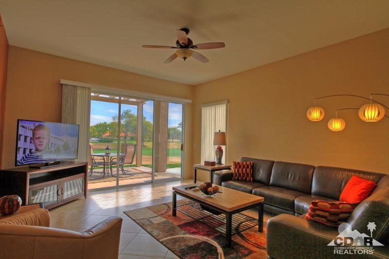 39 Colonial Drive Rancho Mirage, CA 92270 - Photo 2 of 34 a living room with furniture and a large window
