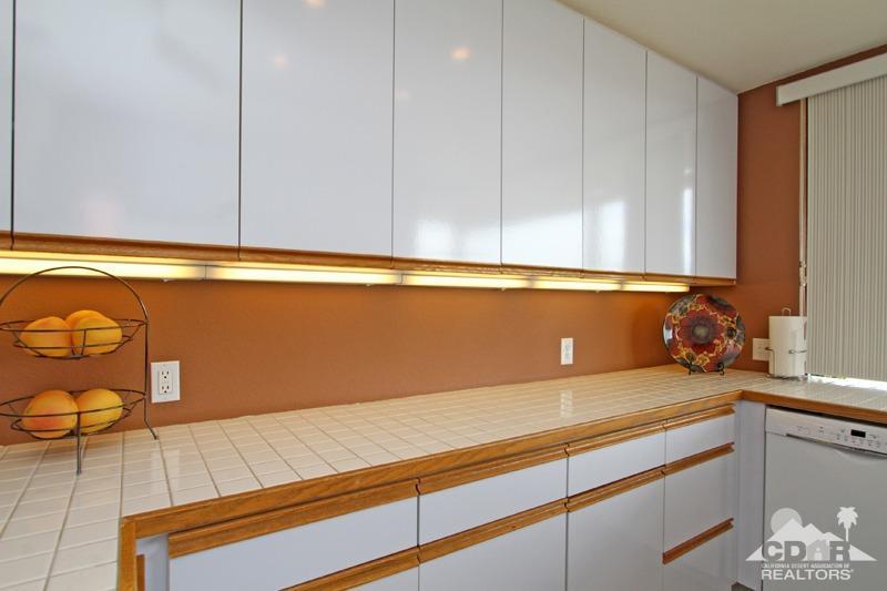 39 Colonial Drive Rancho Mirage, CA 92270 - Photo 15 of 34 a view of a bathroom with a sink and dishwasher