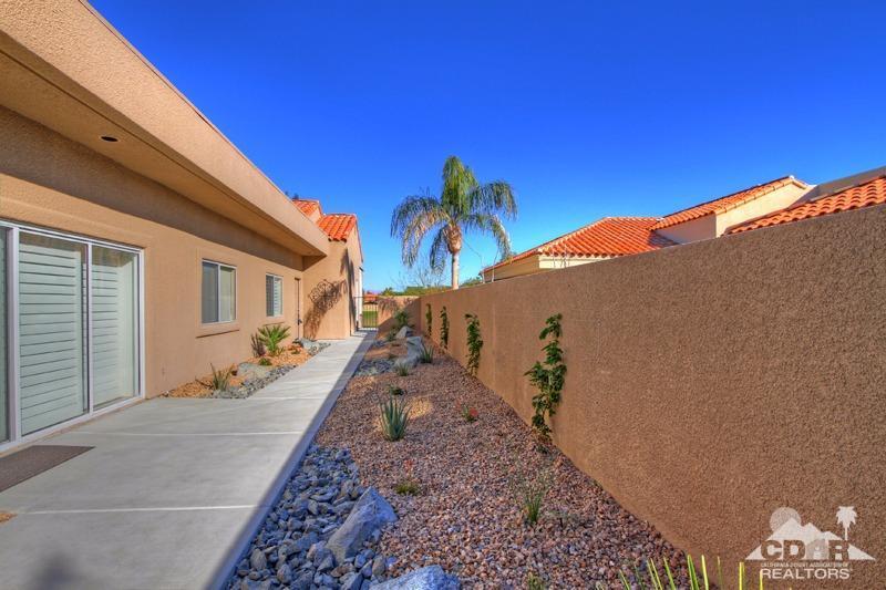 39 Colonial Drive Rancho Mirage, CA 92270 - Photo 34 of 34 a view of a house with a backyard