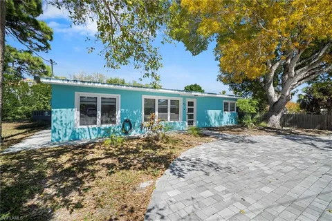 a view of a back yard of the house