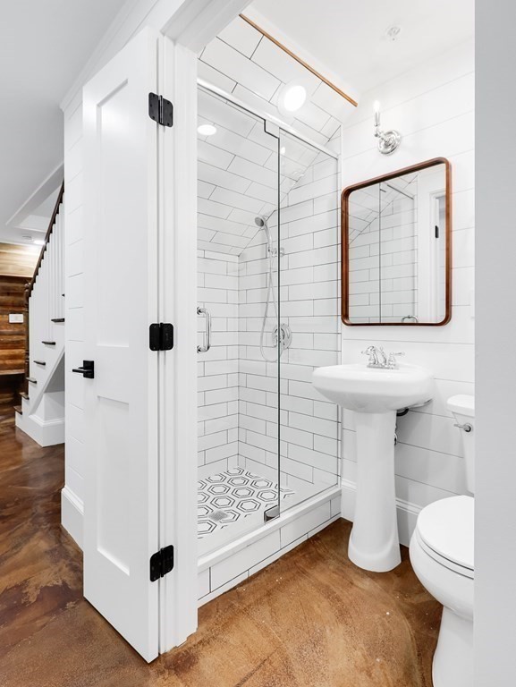 30 Copeland Street, Unit 1 Boston, MA 02119 - Photo 25 of 40 a bathroom with a sink toilet and shower