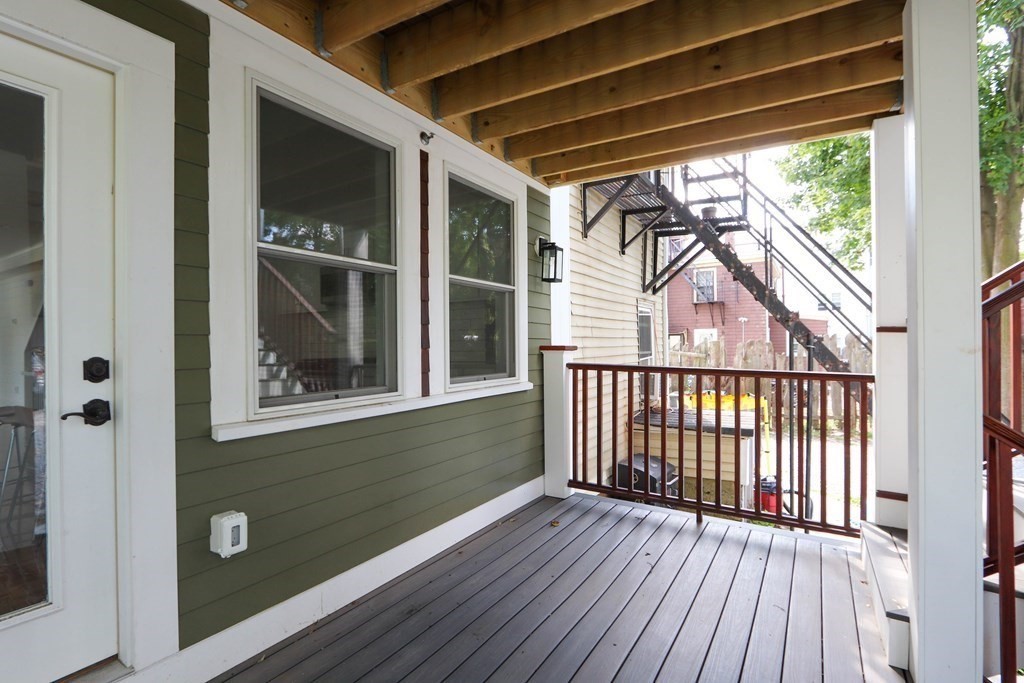 30 Copeland Street, Unit 1 Boston, MA 02119 - Photo 35 of 40 a view of porch with a lots of stairs