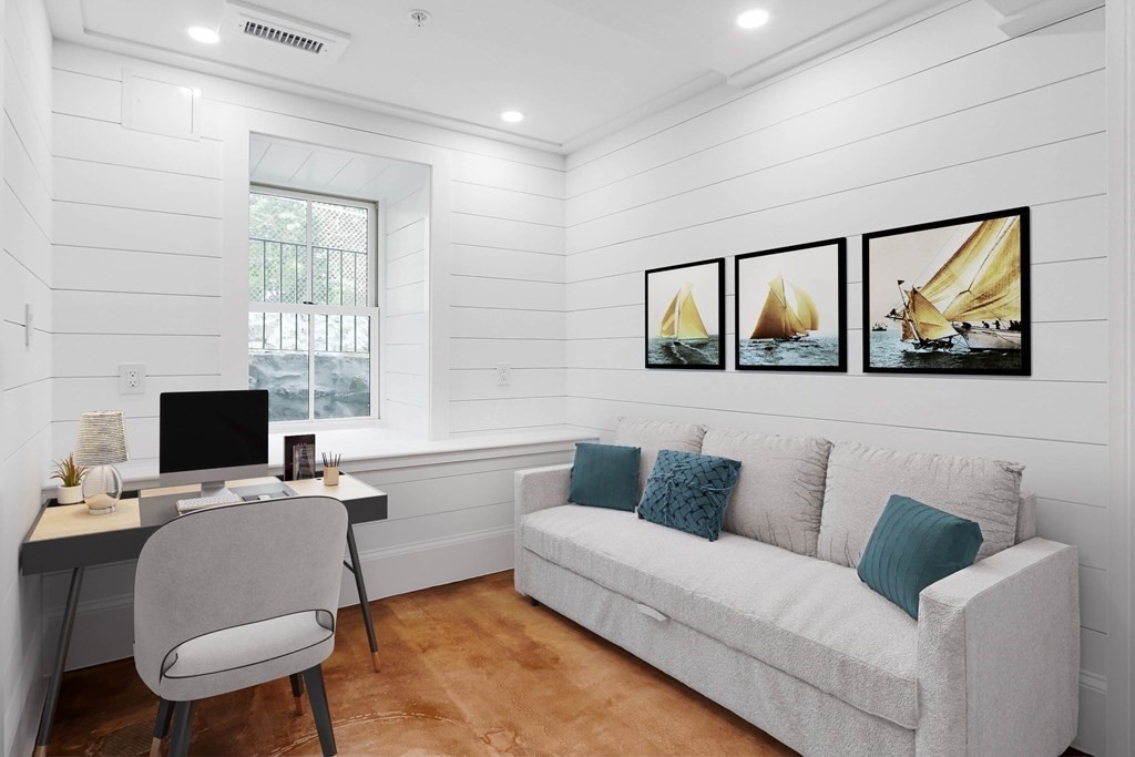 30 Copeland Street, Unit 1 Boston, MA 02119 - Photo 5 of 40 a living room with furniture fireplace and a window