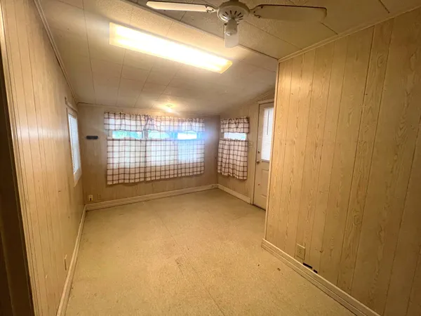a view of a room with windows