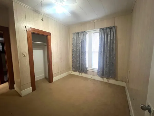 an empty room with windows