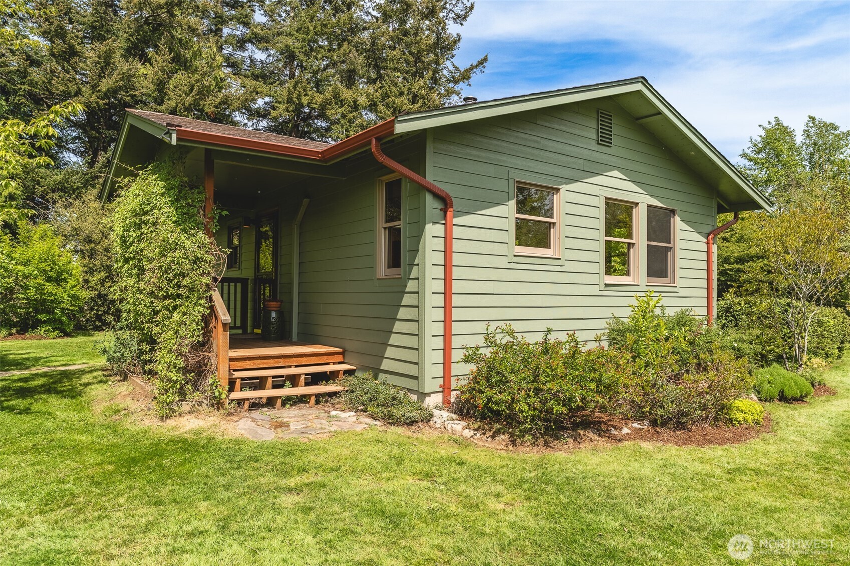 3994 Hoff Road Bellingham, WA 98225 - Photo 4 of 40 a front view of a house with garden