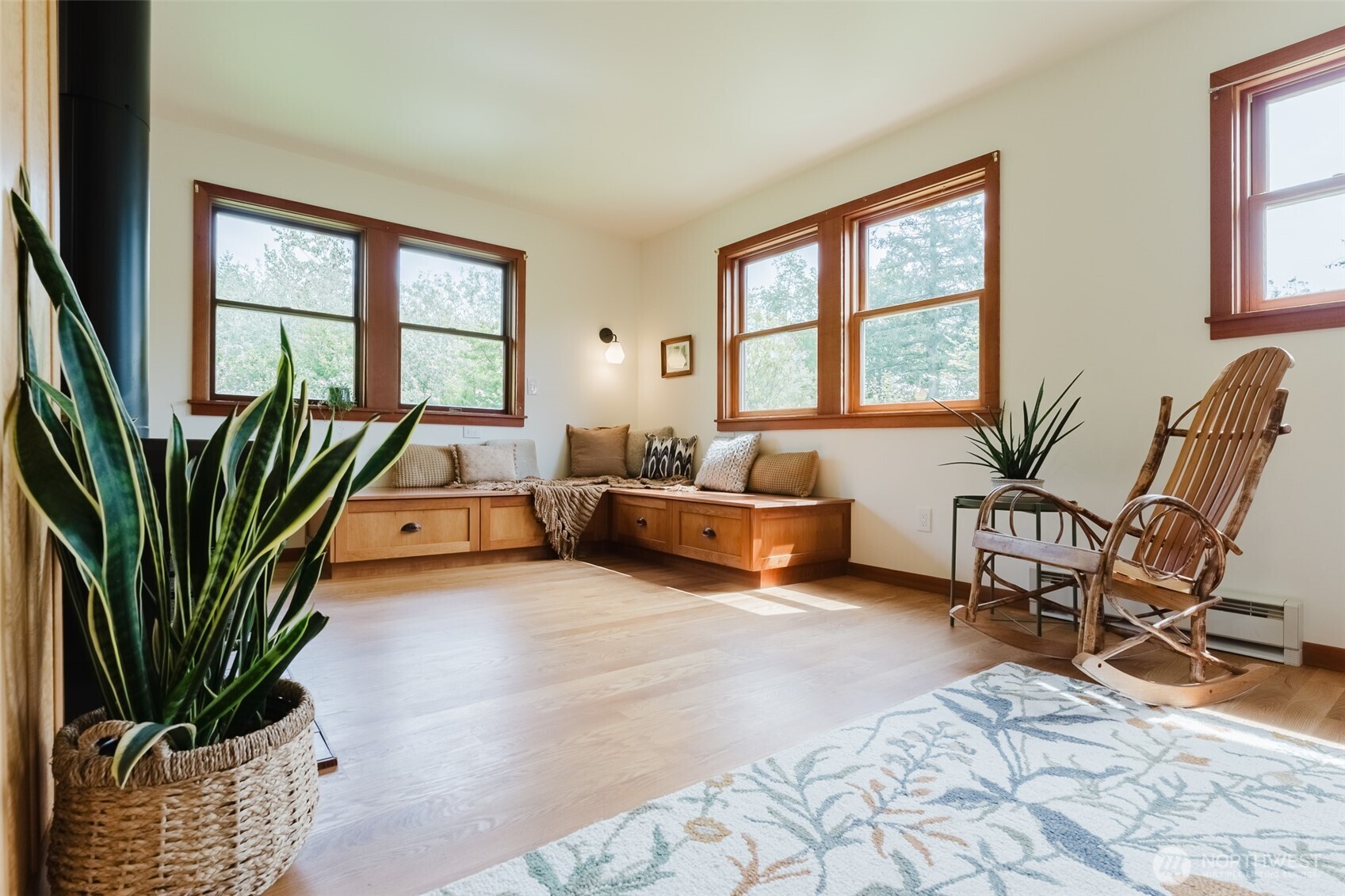 3994 Hoff Road Bellingham, WA 98225 - Photo 9 of 40 a living room with furniture floor to ceiling window and a potted plant