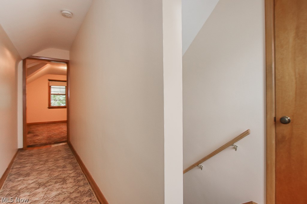 14579 Pease Road Maple Heights, OH 44137 - Photo 17 of 30 Upstairs hallway that leads to bedroom and storage room on the right.