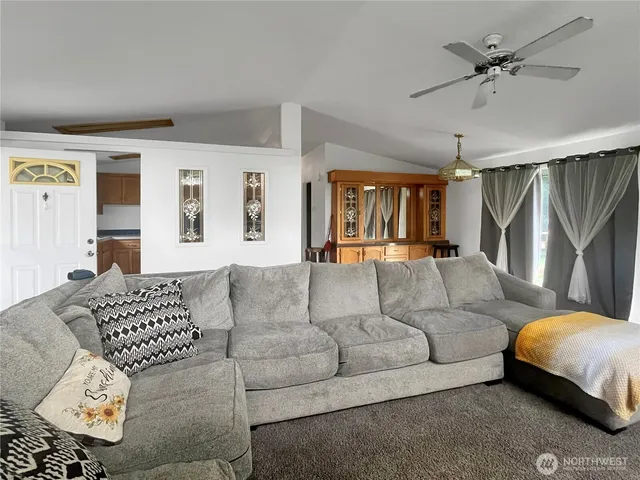 a living room with furniture and a couch