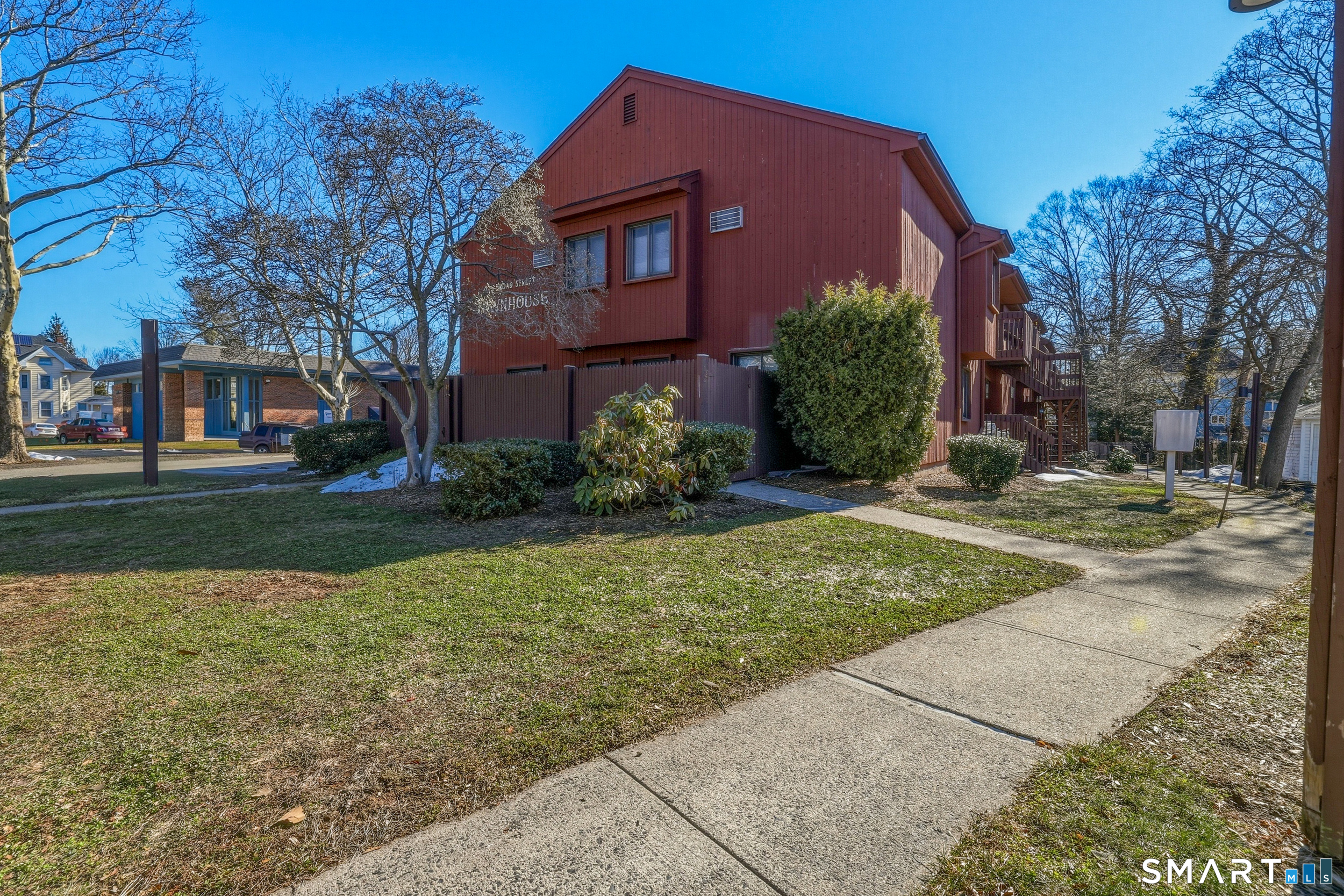 275 Broad Street, Unit 9 Meriden, CT 06450 - Photo 15 of 21 a front view of a house with garden