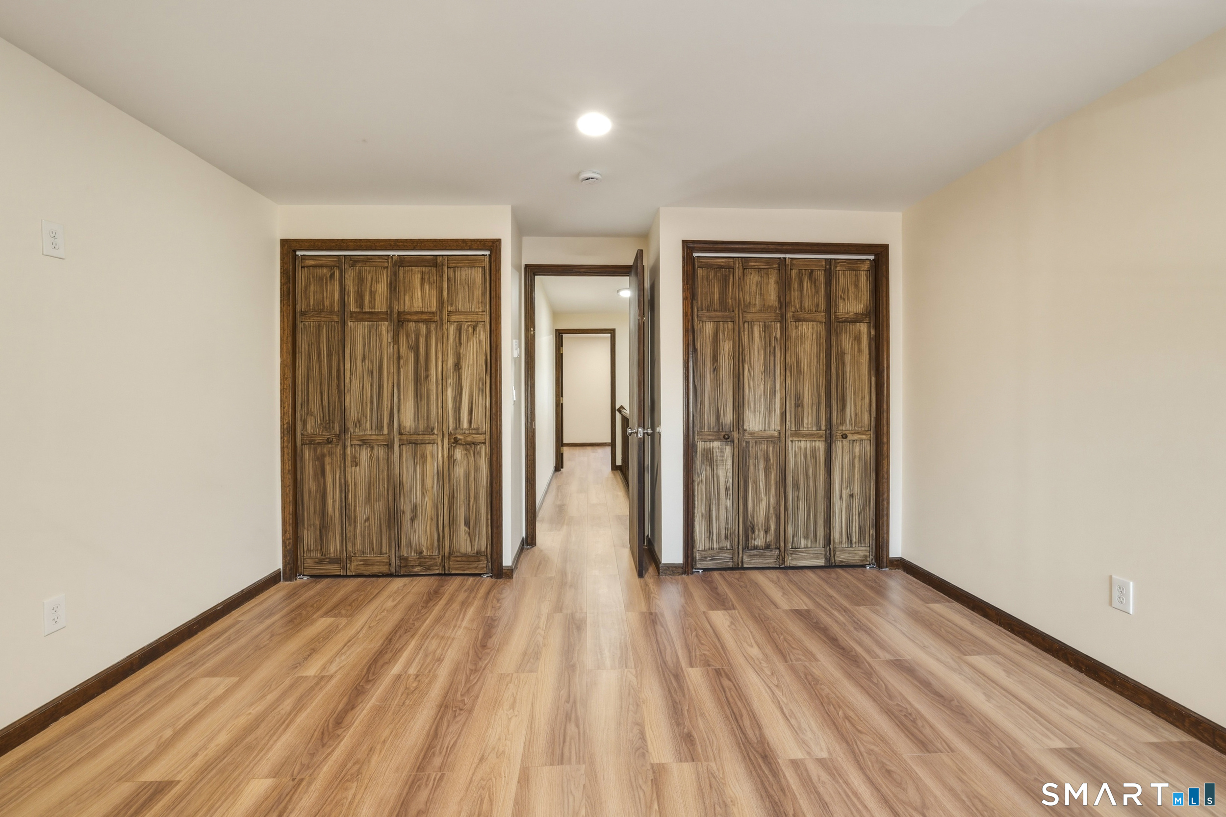 275 Broad Street, Unit 9 Meriden, CT 06450 - Photo 8 of 21 wooden floor and windows in a room