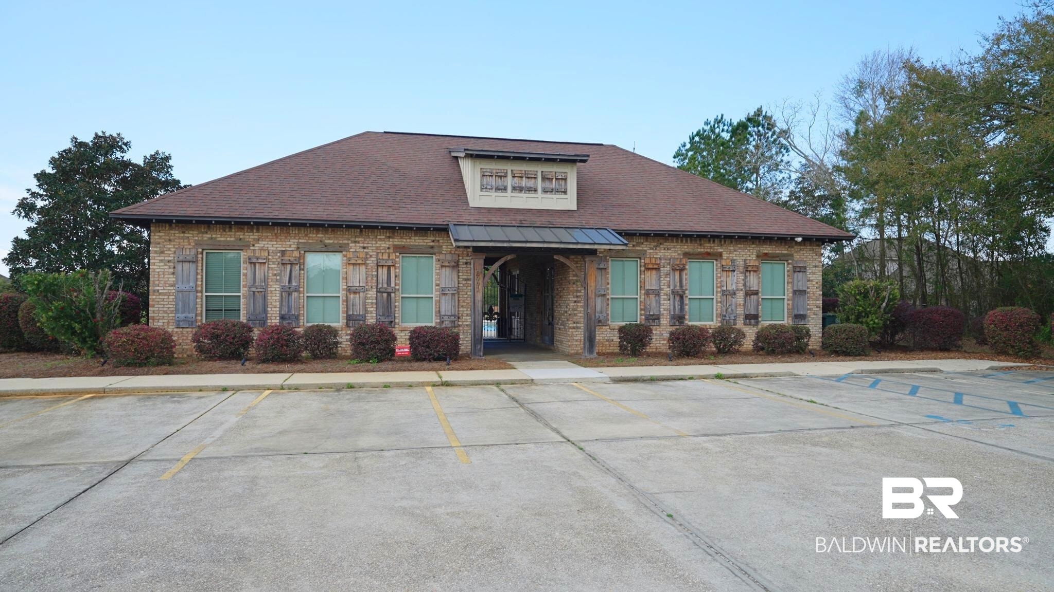 8508 Rosedown Lane Daphne, AL 36526 - Photo 27 of 29 View of building exterior featuring uncovered parking