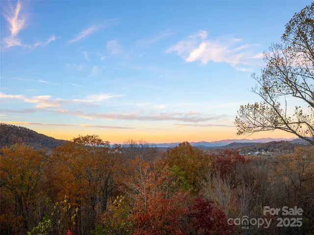a view of lake and mountain