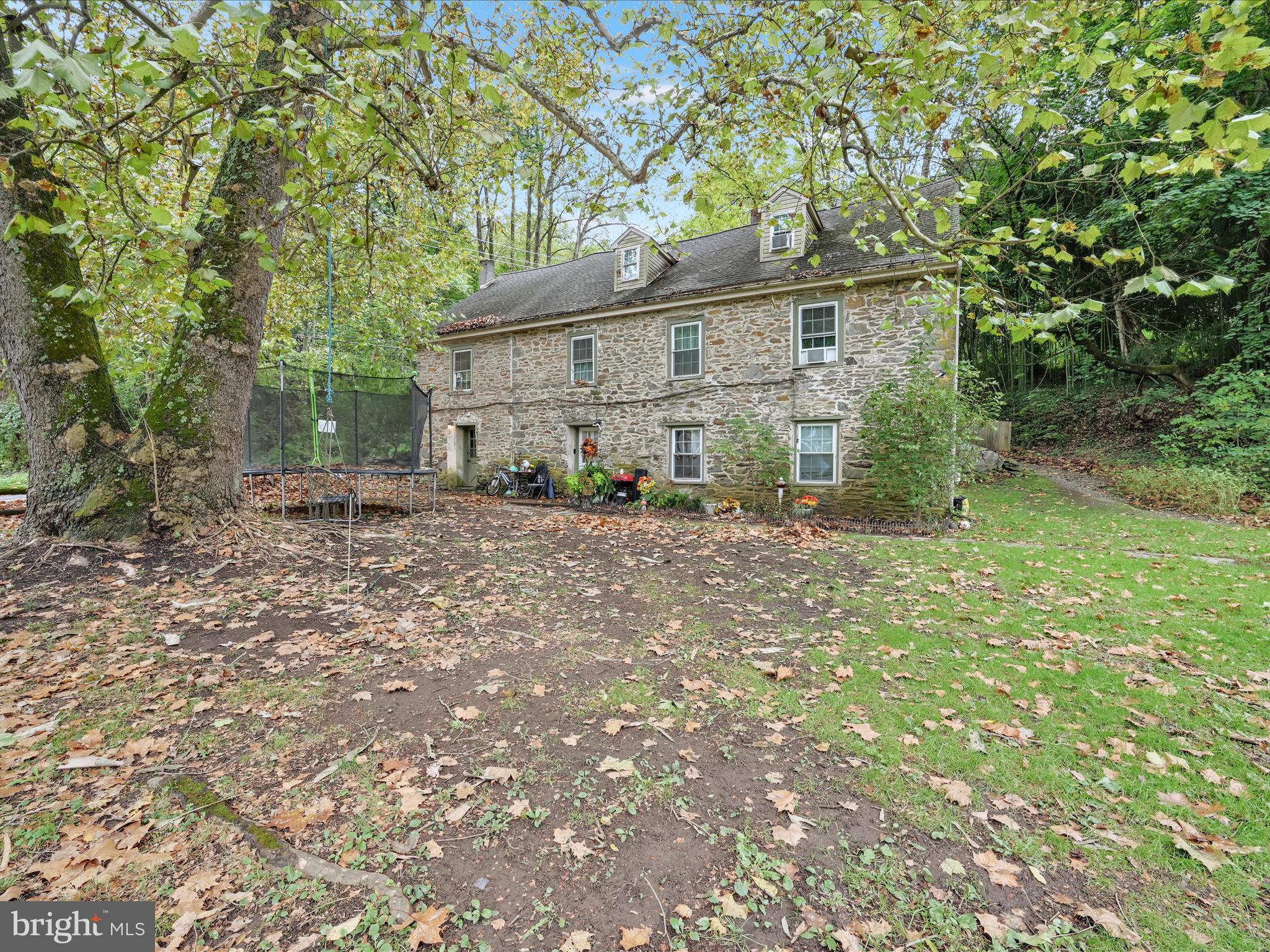 103 Mercer Mill Road Landenberg, PA 19350 - Photo 2 of 42 a backyard of a house with table and chairs