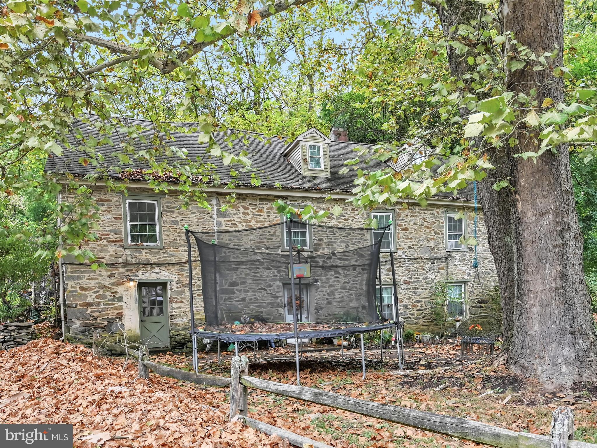 103 Mercer Mill Road Landenberg, PA 19350 - Photo 39 of 42 a backyard of a house with chairs and table