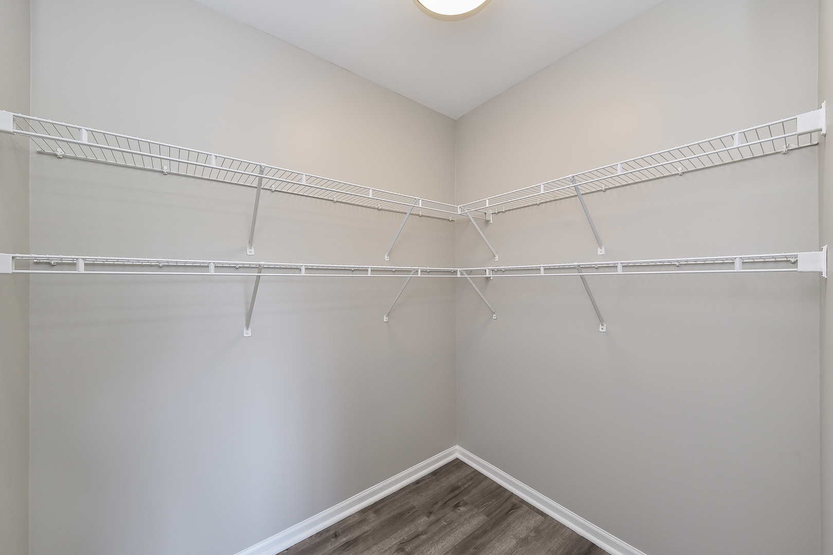 1556 McClure Road, Unit 1556 Aurora, IL 60505 - Photo 13 of 17 a view of a room with racks on the wall