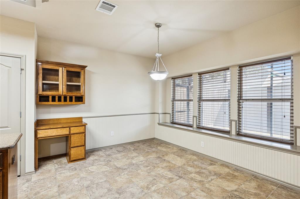 1749 Potomac Drive, Unit R Burleson, TX 76028 - Photo 7 of 15 a view of an empty room with a window