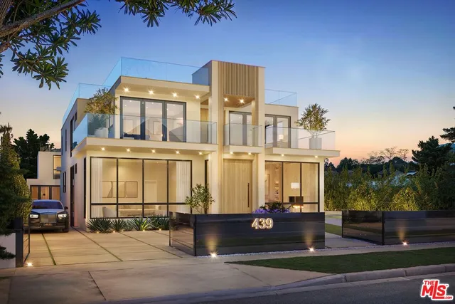 a front view of a building with street view