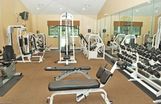an aerial view of a houses with yard