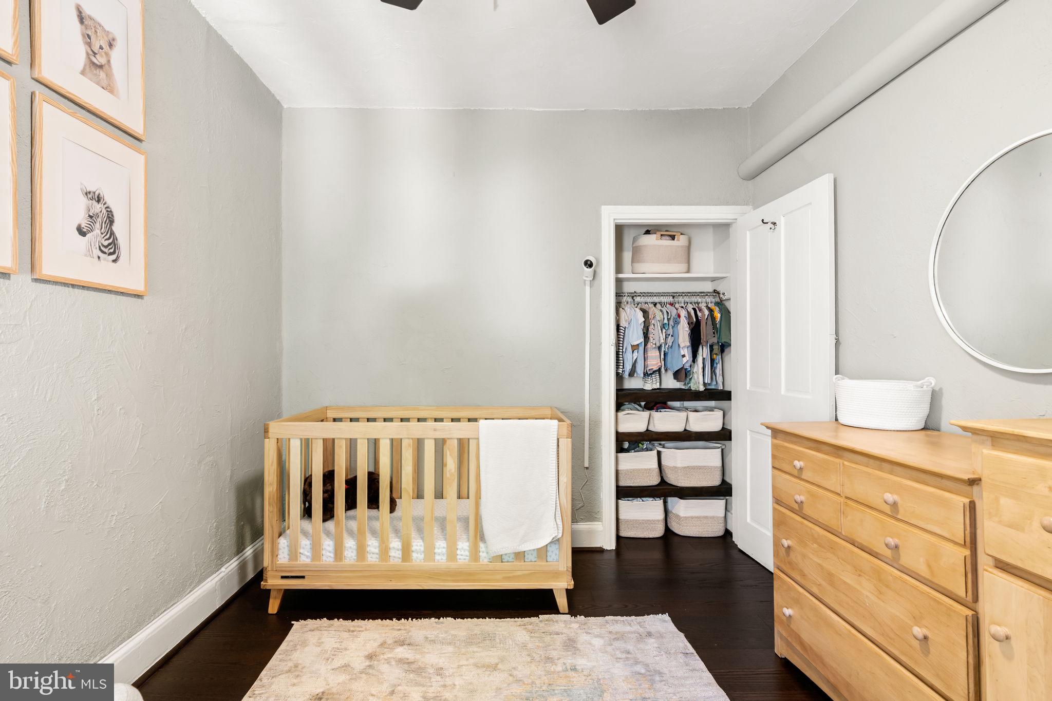 4751 Fowler Street Philadelphia, PA 19127 - Photo 13 of 26 a bedroom with a bed and a window