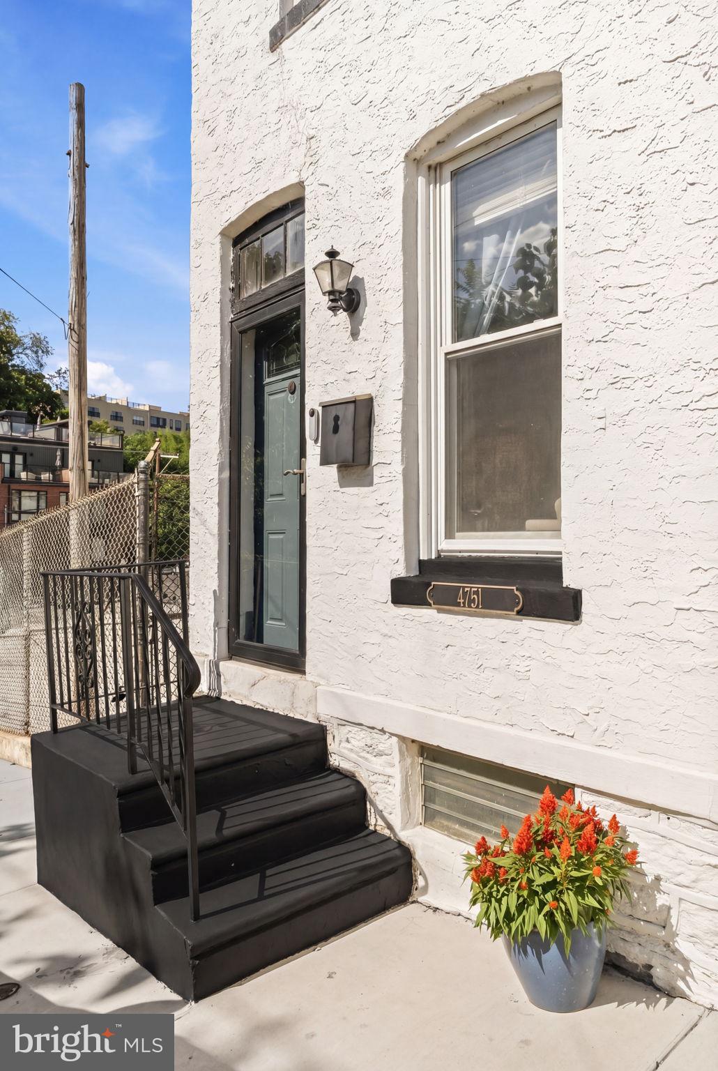 4751 Fowler Street Philadelphia, PA 19127 - Photo 22 of 26 a front view of a house with entryway