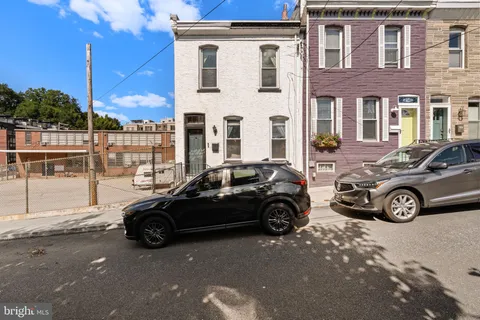 a car parked in front of a house